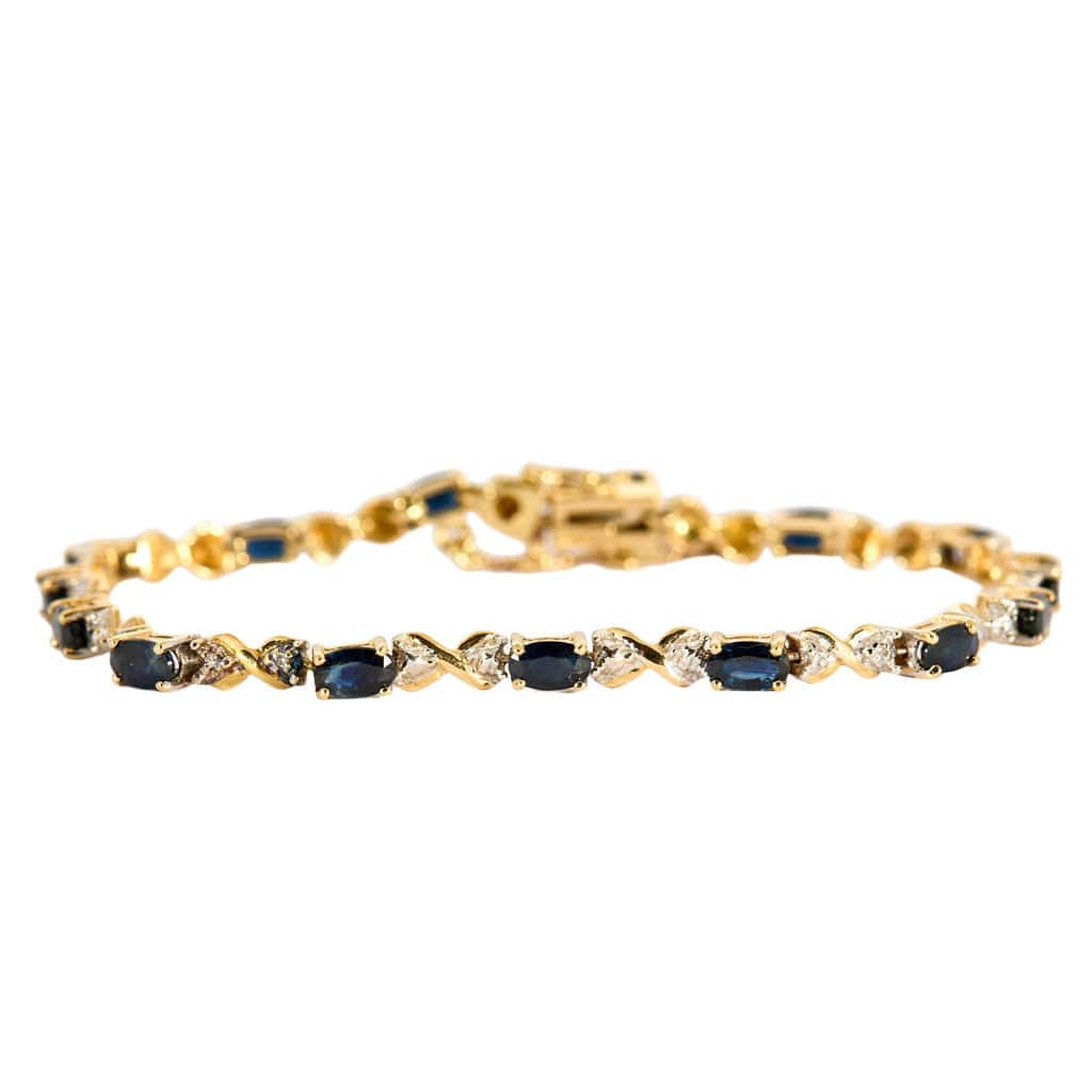 Prestige bracelet in yellow gold, white gold, sapphires and diamonds