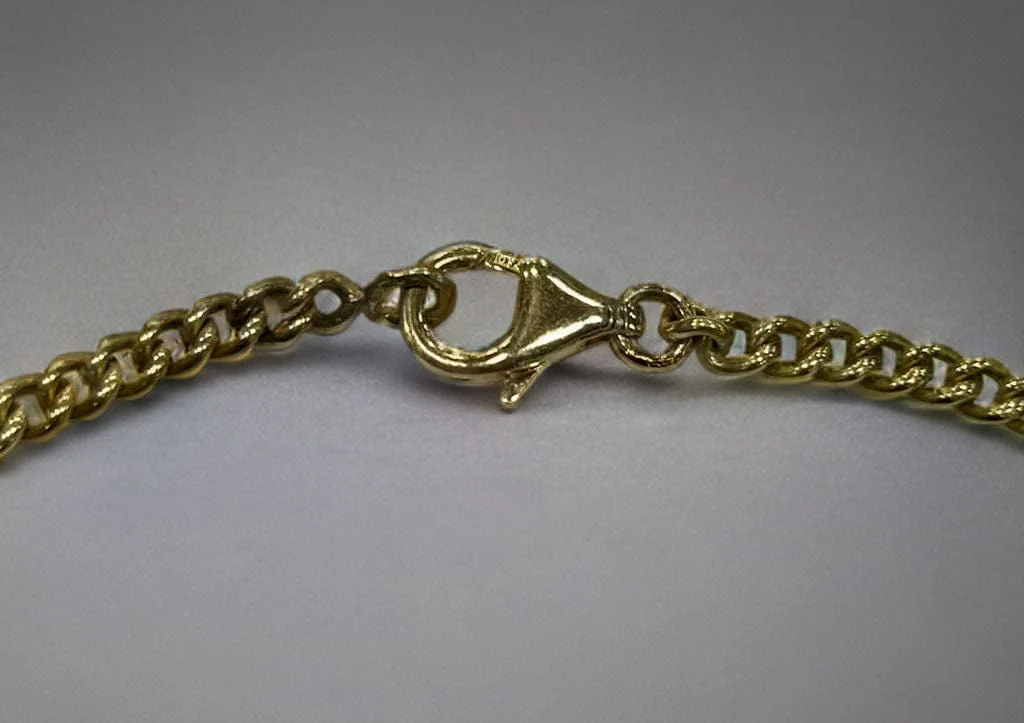 Yellow gold farm charm bracelet