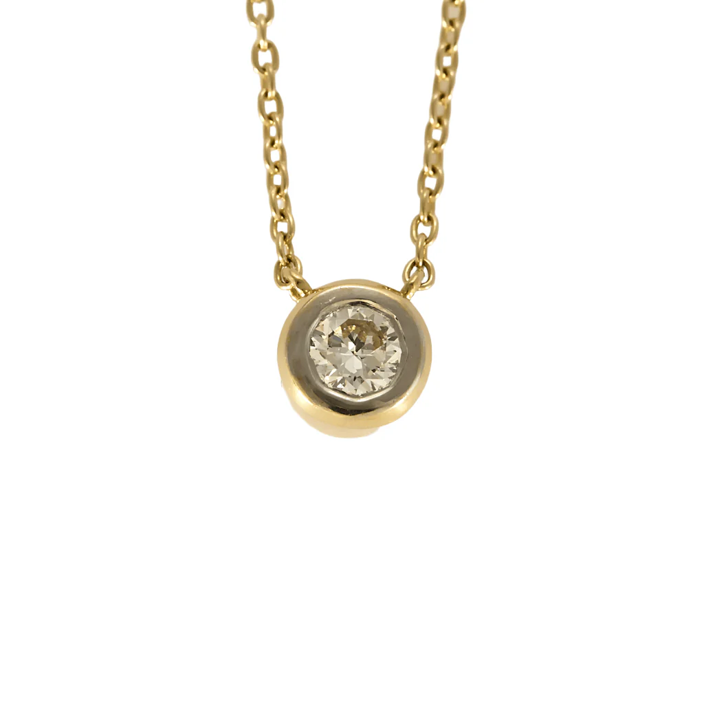 Necklace Solitaire in yellow gold and white gold, diamond approximately 0.15 carat.