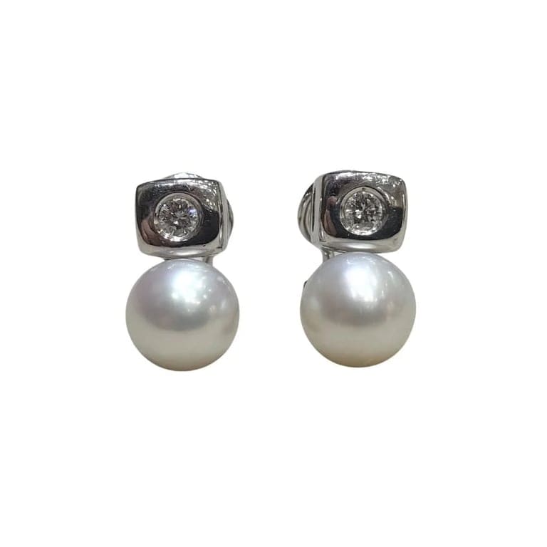 Pearl and brilliant pendants in white gold