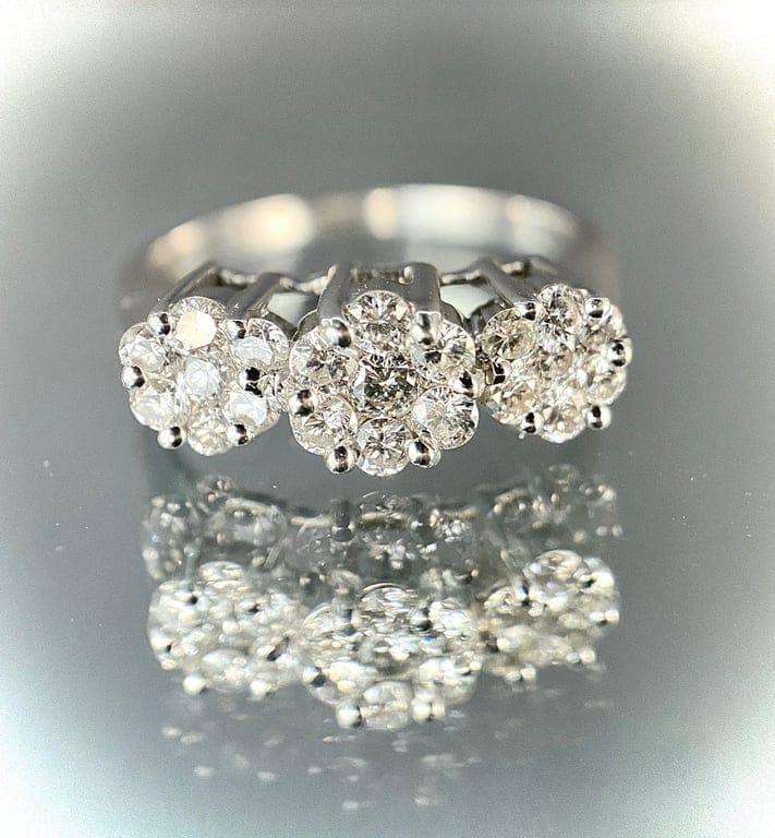 White gold flower trio ring with diamonds