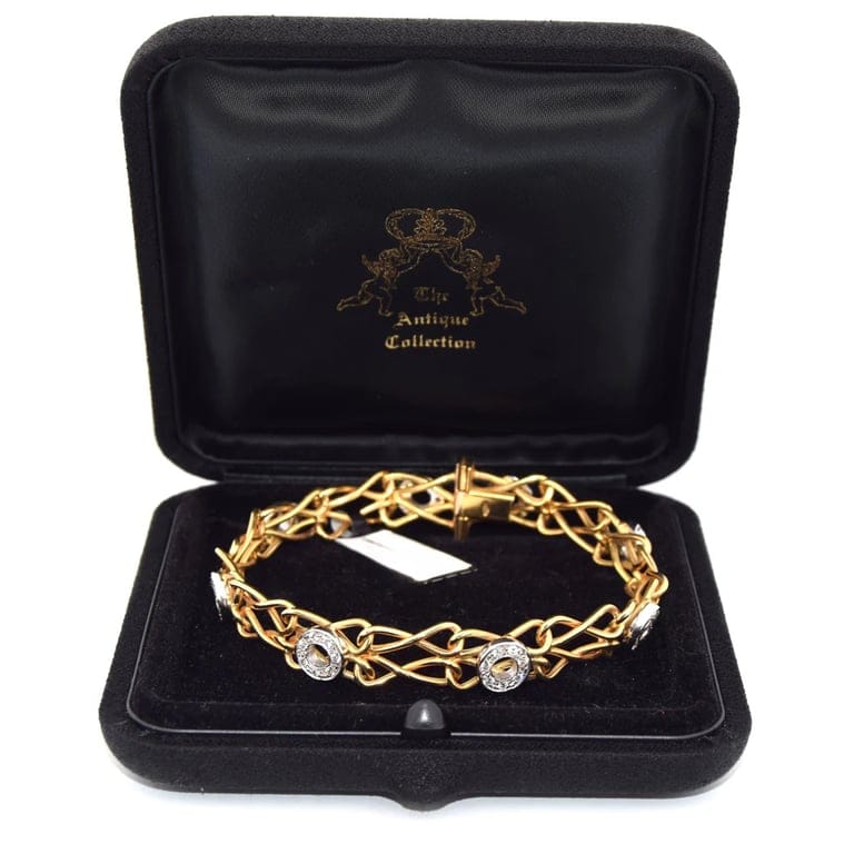 BRACCIALE IN GOLD GIALLO E BIANCO 18 KT