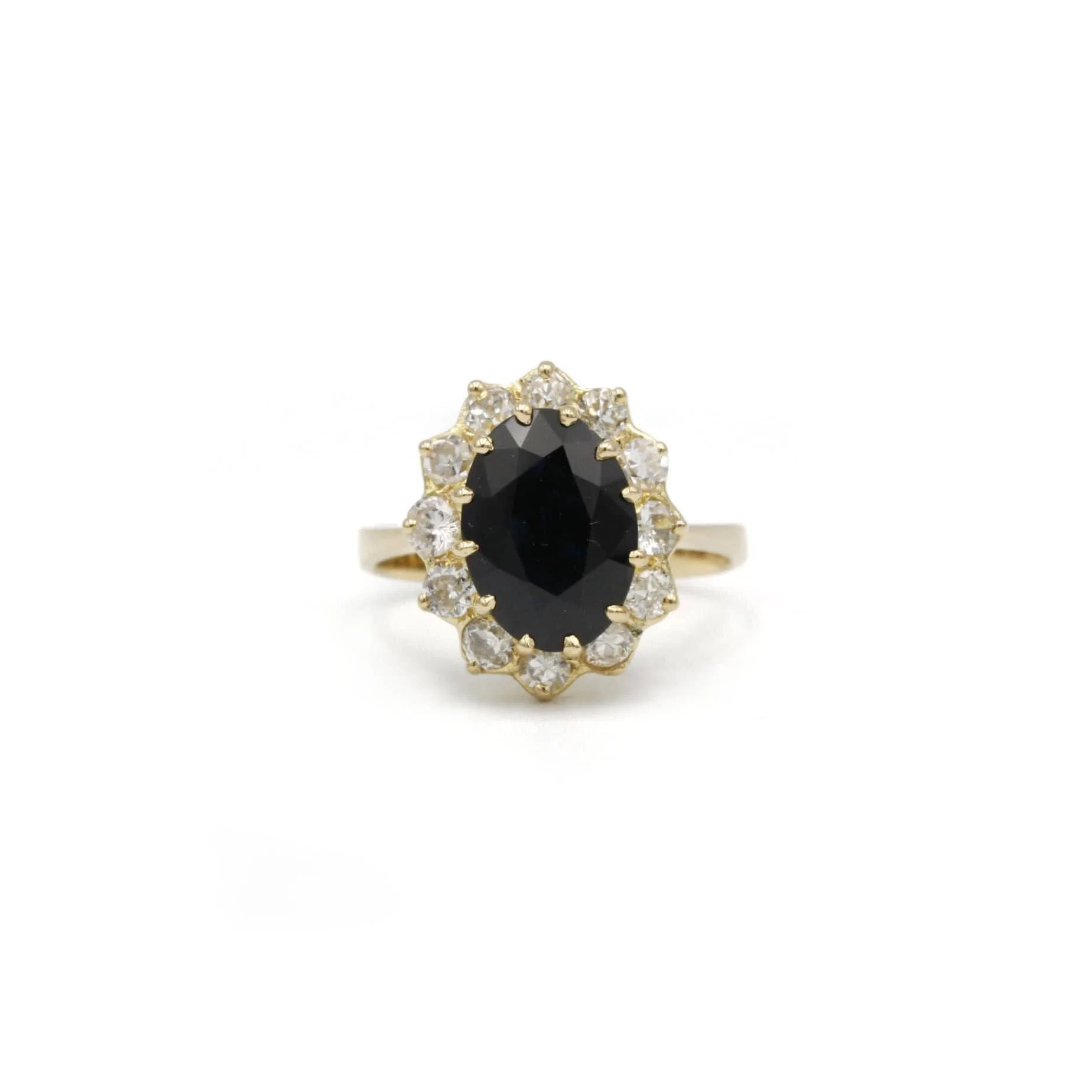 Yellow gold sapphire and diamond ring