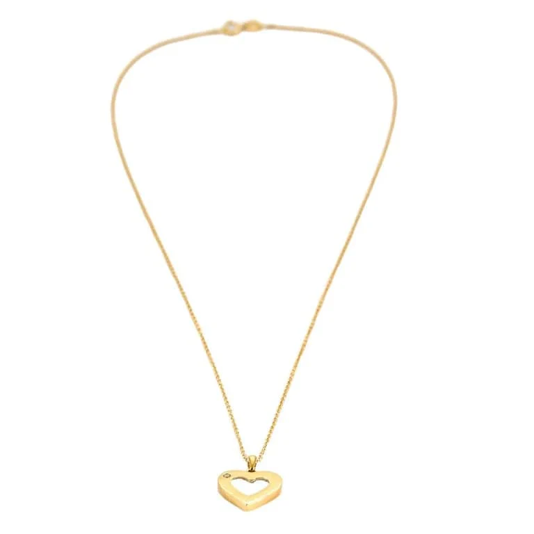 Yellow gold and diamond heart necklace