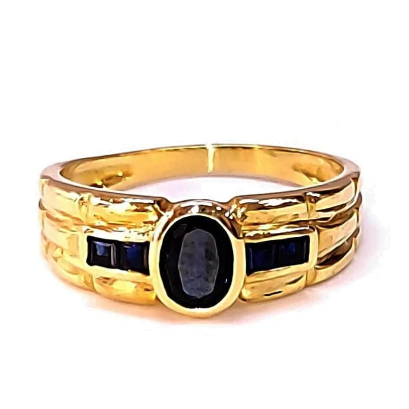 Yellow gold sapphire bangle ring