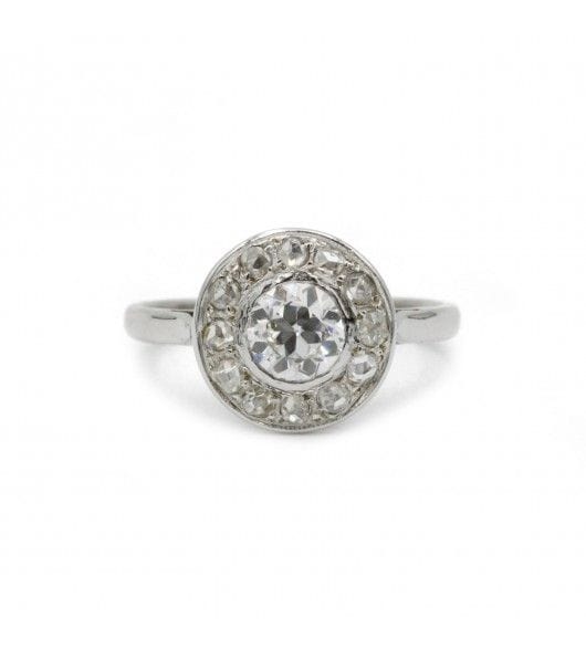 Surrounded diamond ring