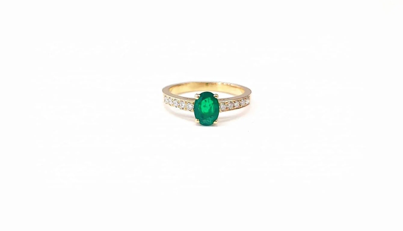 Yellow gold emerald and diamond ring