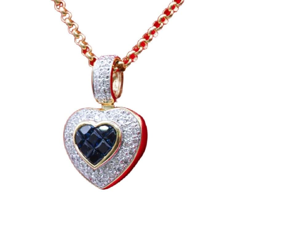 Pendentif cœur en or bicolore 750/000, saphirs et diamants