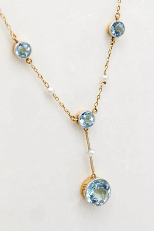 Antique yellow gold necklace and platinum, aquamarines and pearls 