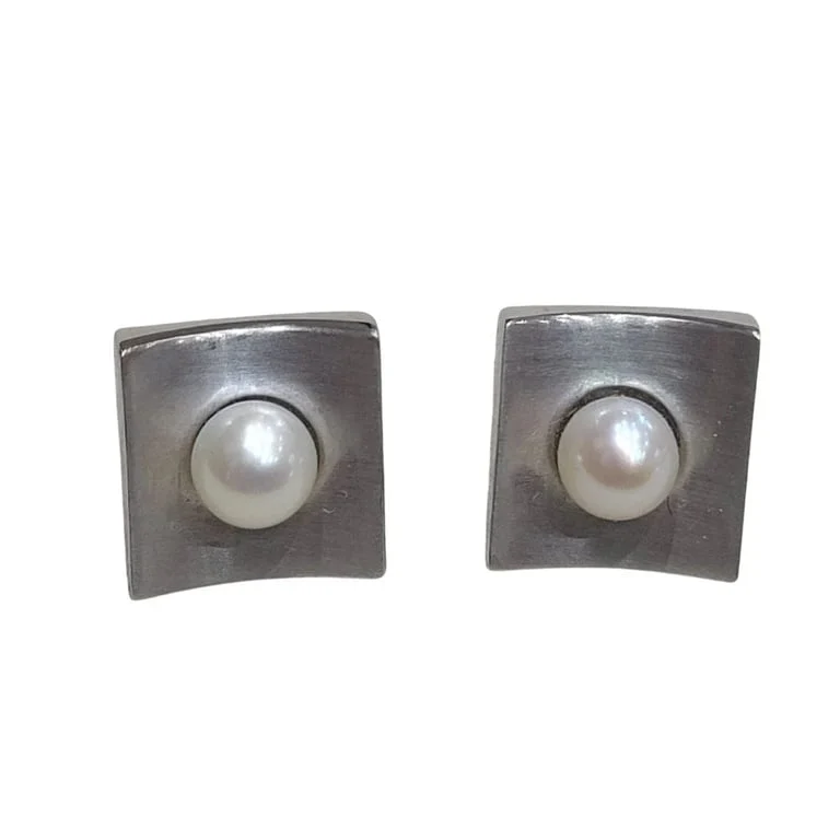 Pearl and white gold pendants