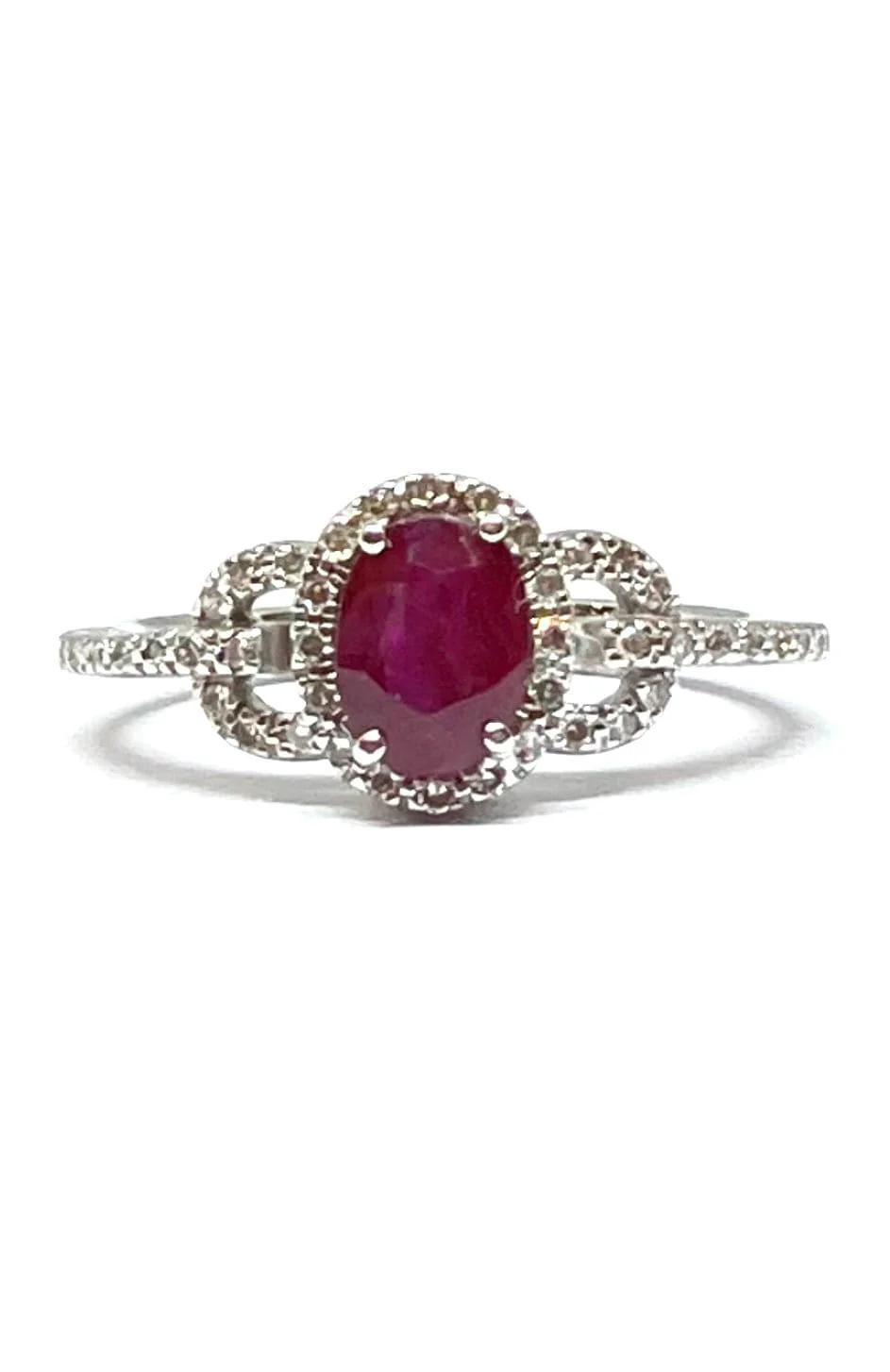 Women's white gold ring with diamonds and rubies