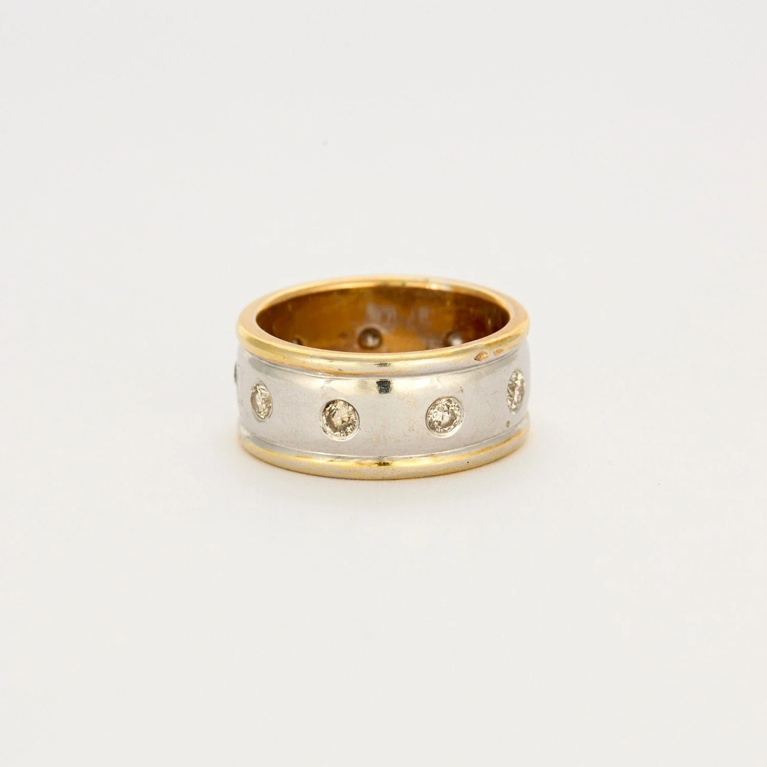 Yellow gold, white gold and diamond wedding ring