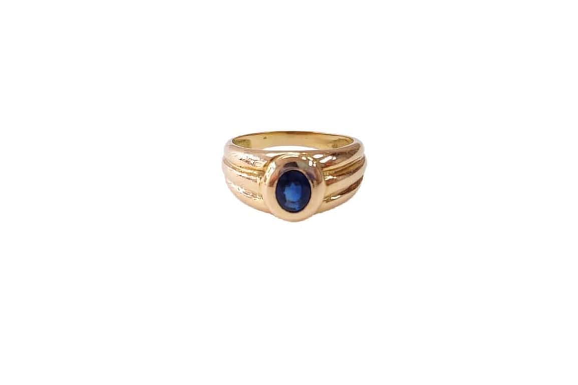 Yellow gold and sapphire bangle ring