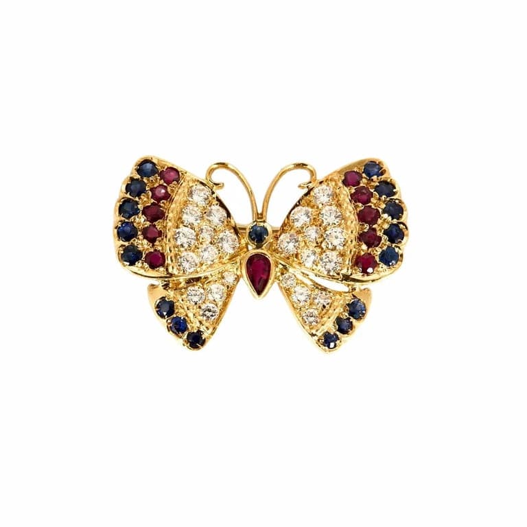 Yellow gold butterfly brooch, sapphires, rubies