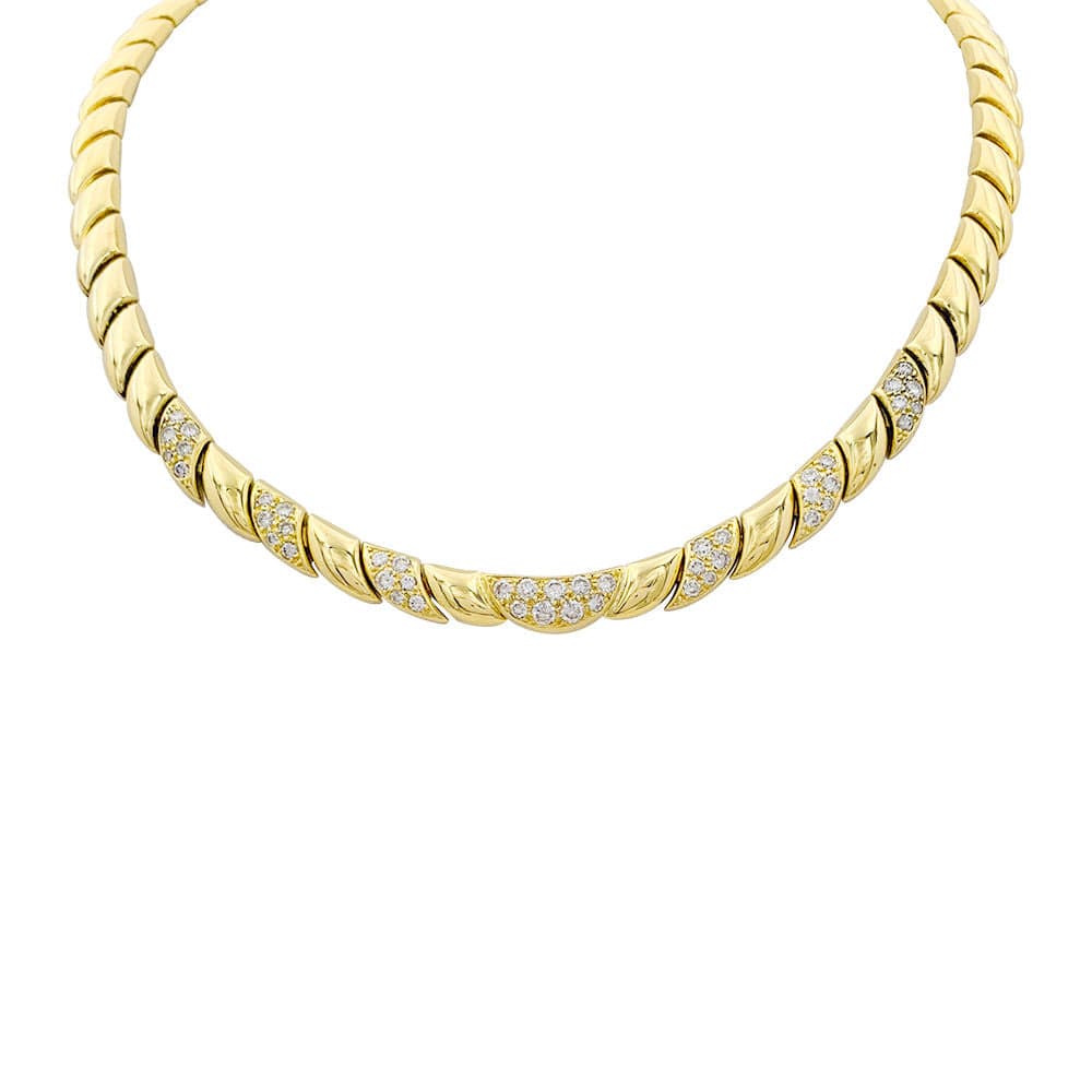 Patek Philippe necklace in yellow gold and diamonds.