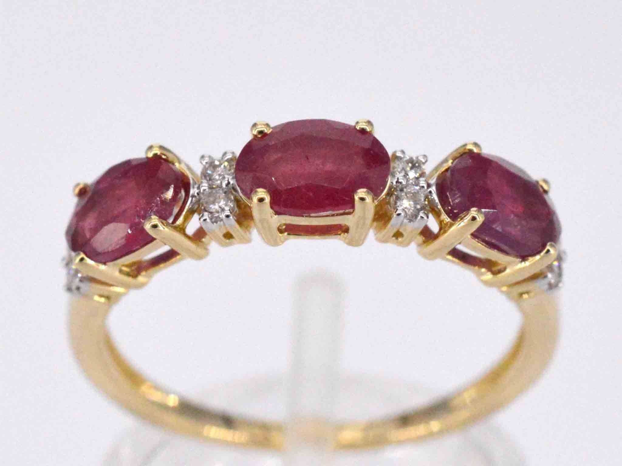 Gold ring with diamonds and ruby