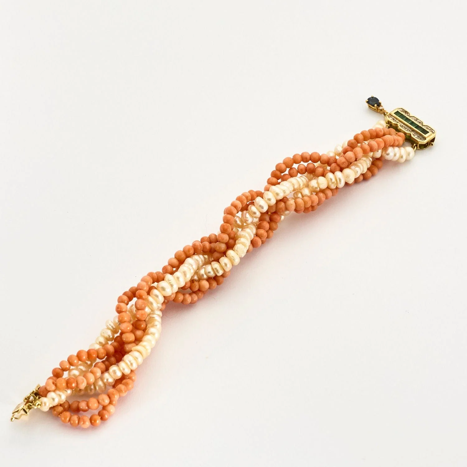 Yellow gold bracelet with baroque pearls, coral, emeralds and diamonds