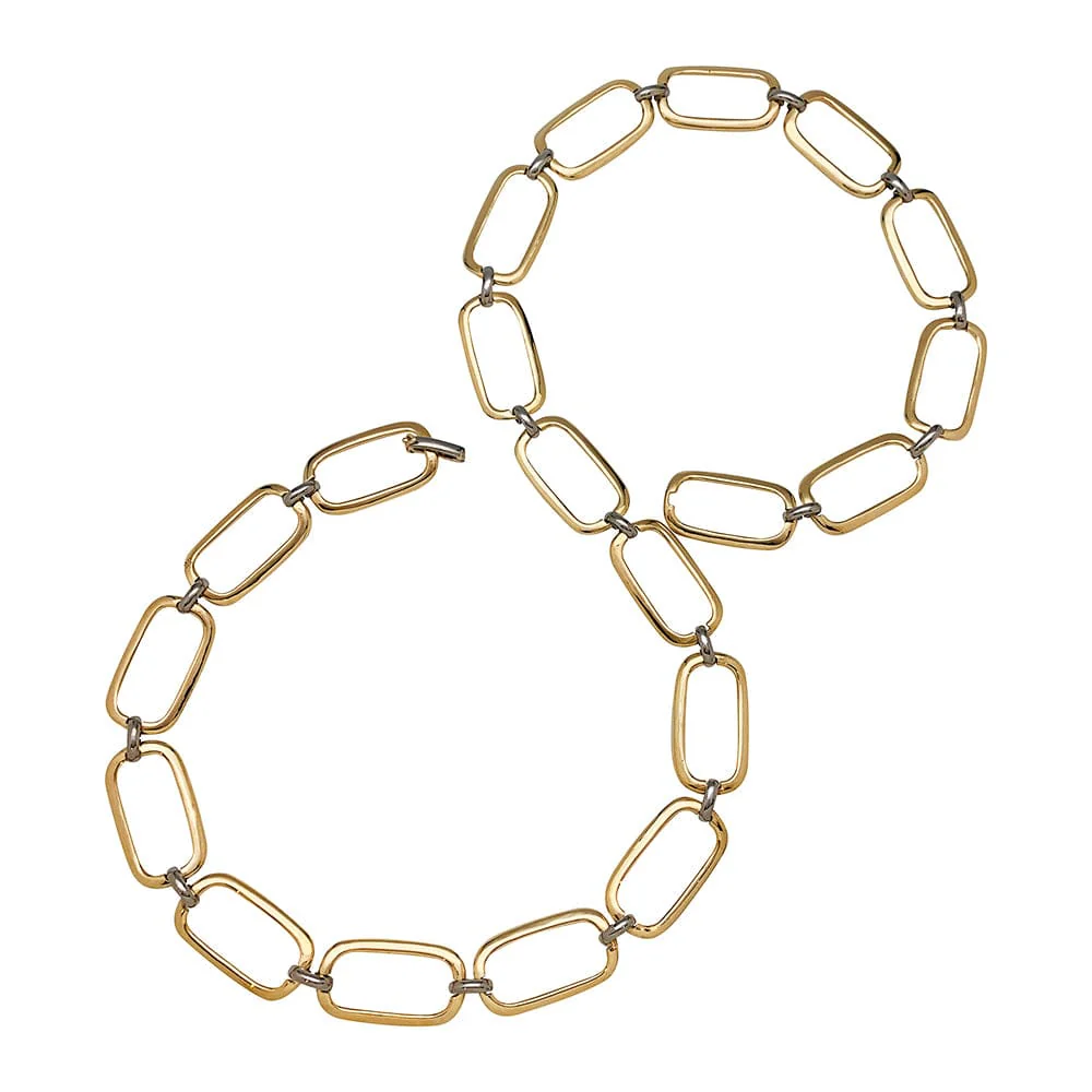 Long two gold necklace.
