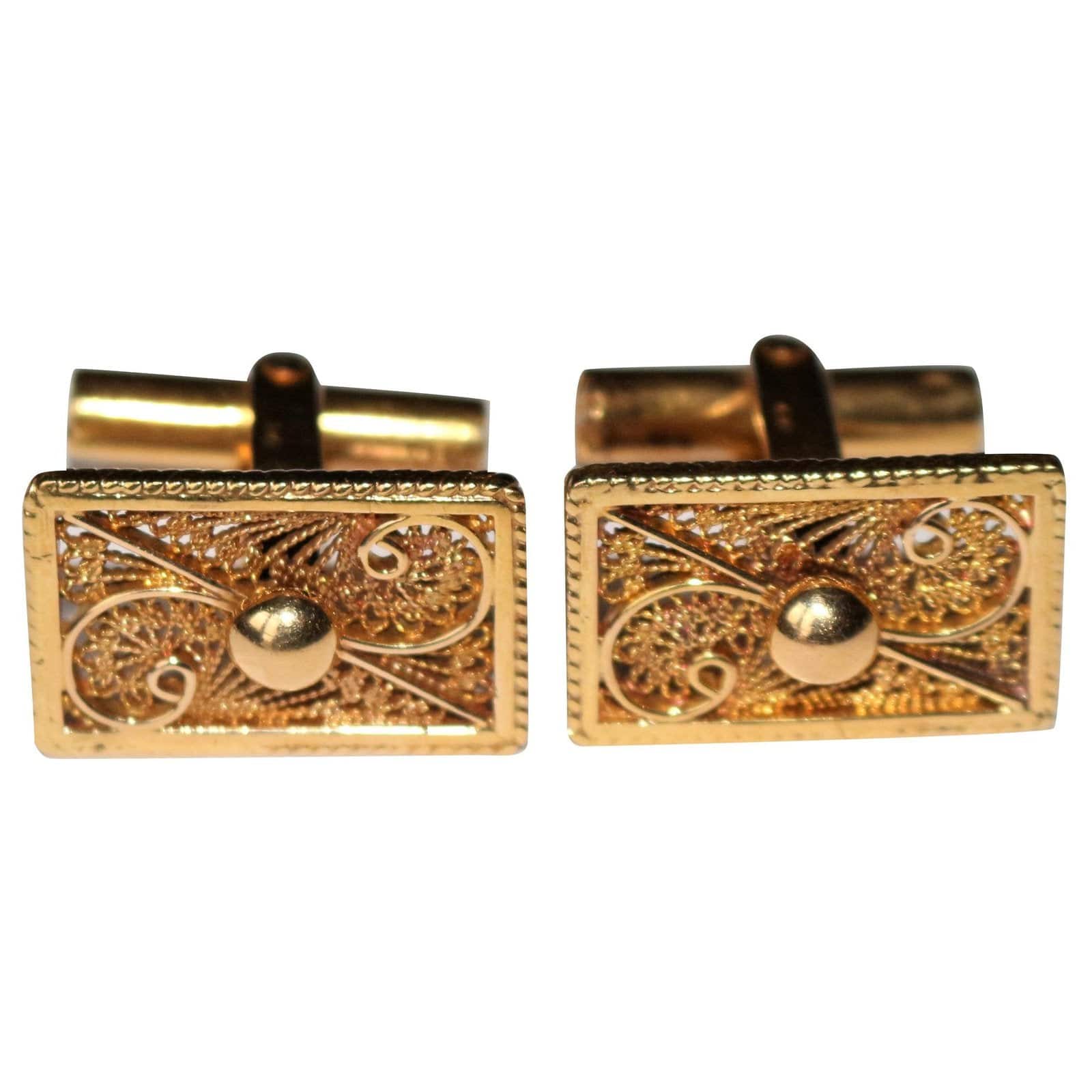 Openwork yellow gold cufflinks