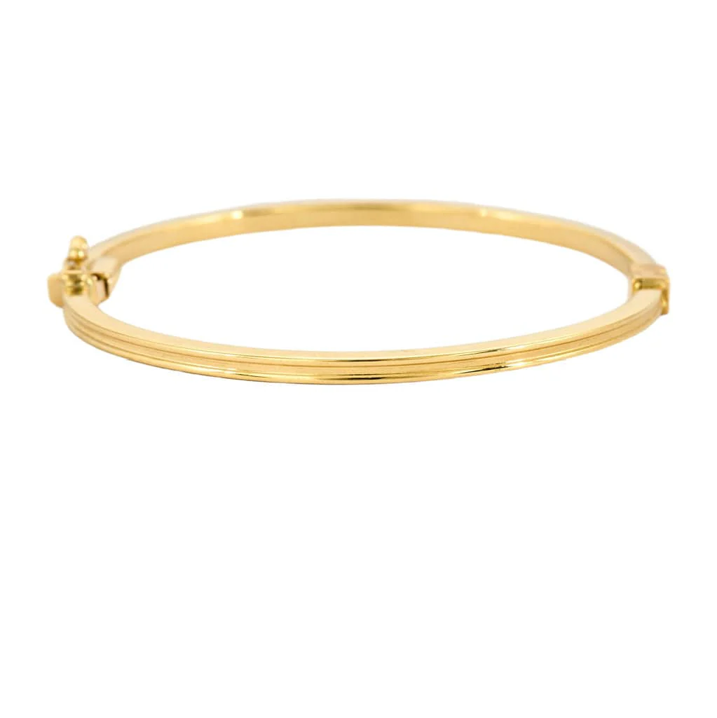 Yellow gold bangle bracelet