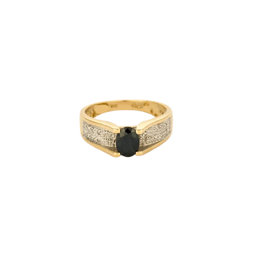 Yellow gold and white gold ring set with a sapphire