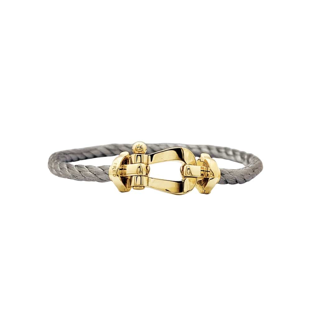 Bracelet Fred, "Force 10", yellow gold, steel. 