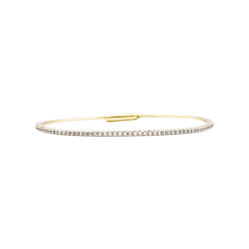 Yellow gold bangle bracelet with diamonds. 