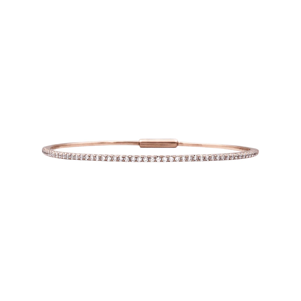 Rose gold bangle bracelet with diamonds. 