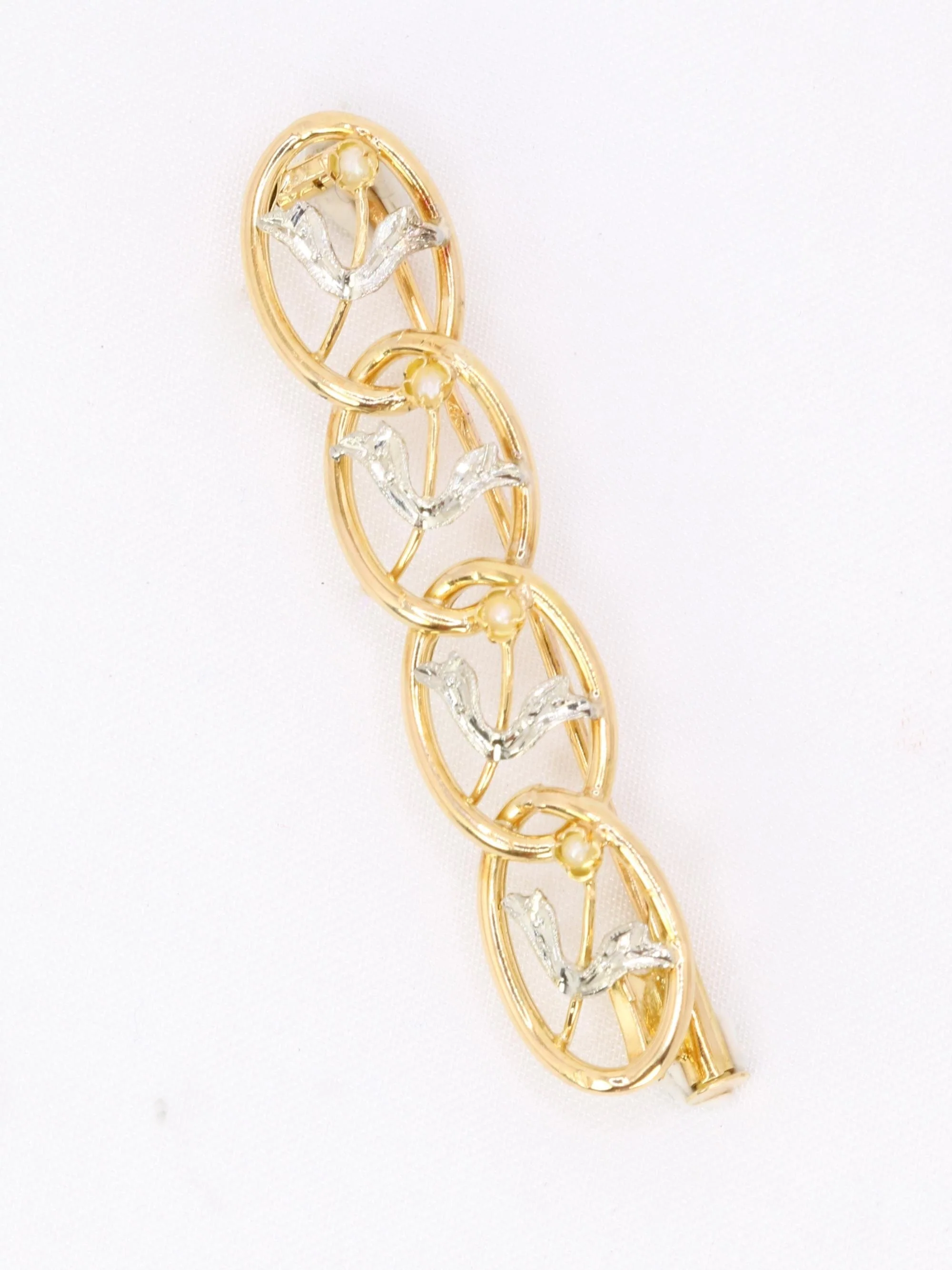 Art Nouveau flower brooch in yellow gold, white gold and pearls